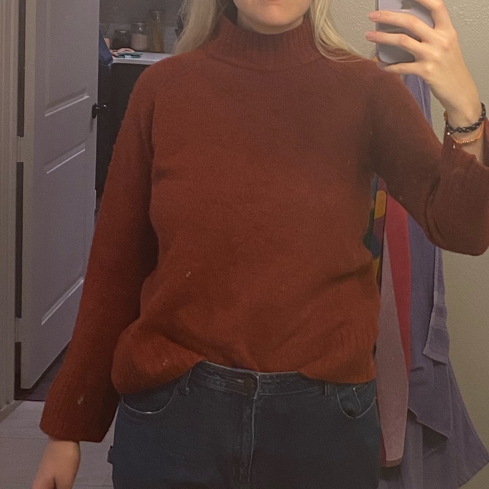 orange turtleneck
